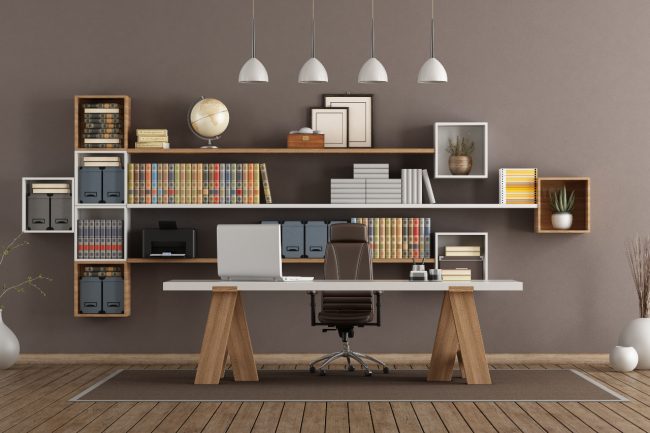 Modern office with wooden bookcase and desk – 3d rendering